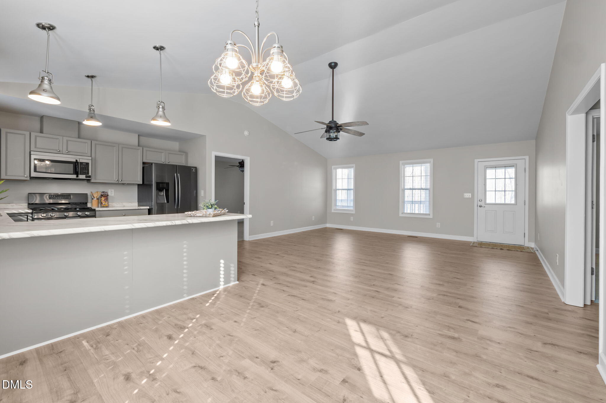 144 Kiser Hicks Road Roxboro, NC 27574 - Photo 11 of 38 a view of a kitchen with a sink cabinets and wooden floor