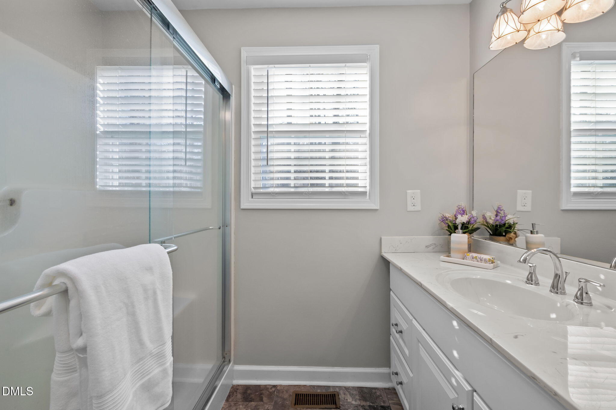 144 Kiser Hicks Road Roxboro, NC 27574 - Photo 17 of 38 a bathroom with a sink a vanity and a tub
