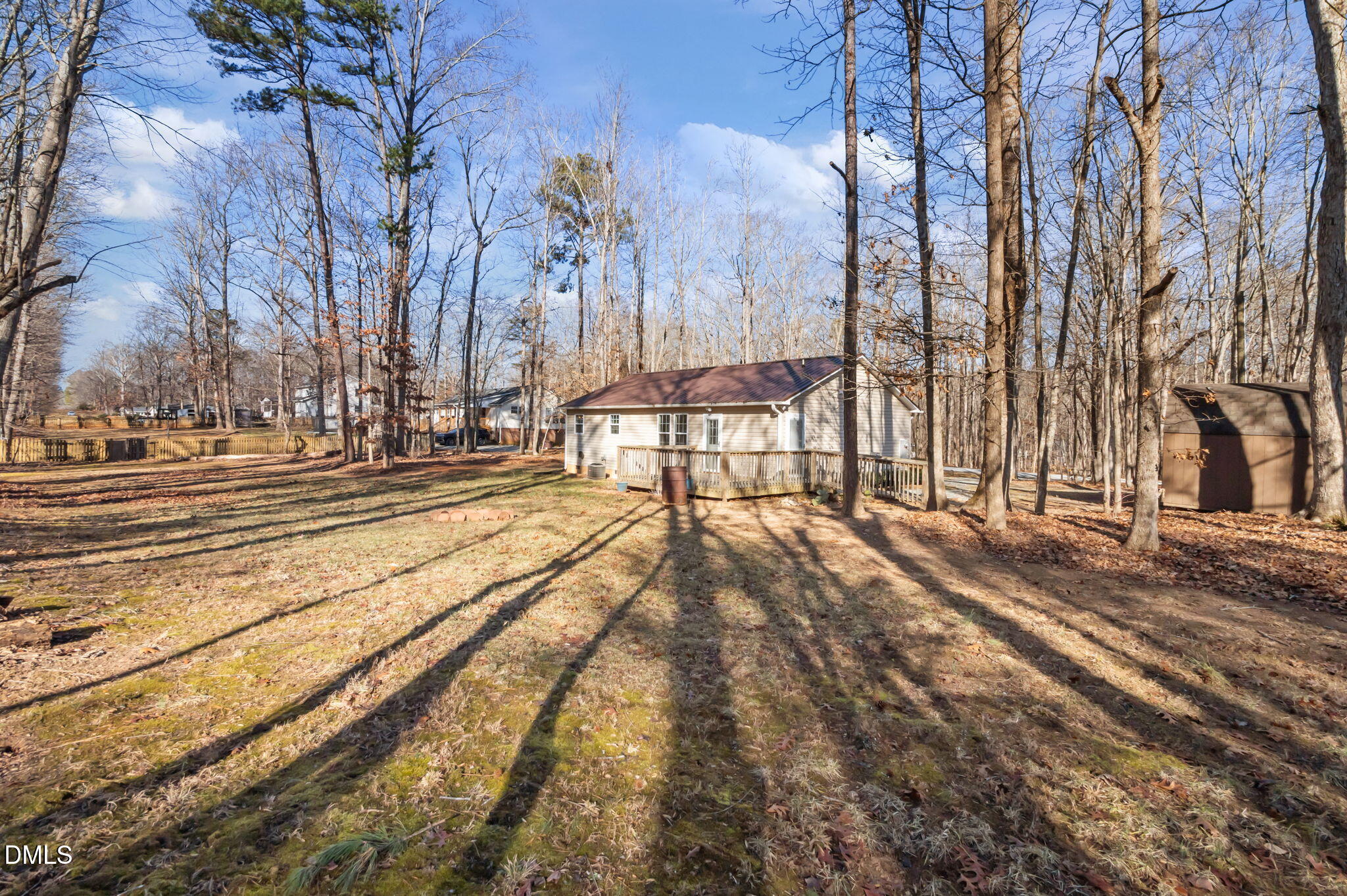 144 Kiser Hicks Road Roxboro, NC 27574 - Photo 28 of 38 a view of a yard with trees