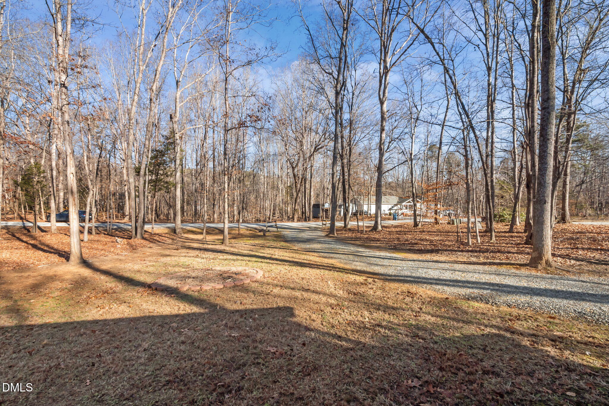 144 Kiser Hicks Road Roxboro, NC 27574 - Photo 35 of 38 a view of a yard with trees