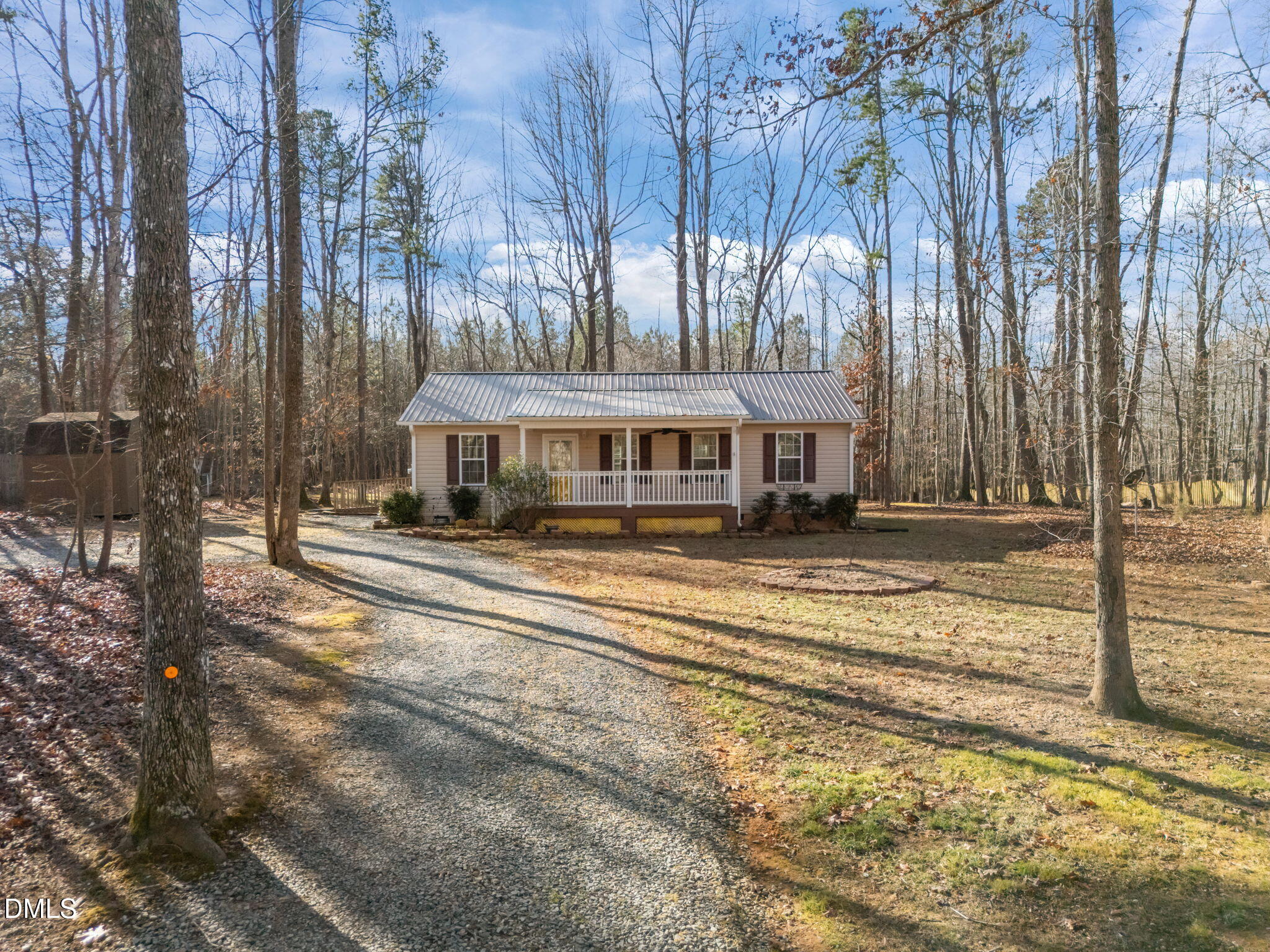 144 Kiser Hicks Road Roxboro, NC 27574 - Photo 36 of 38 a front view of a house with a yard