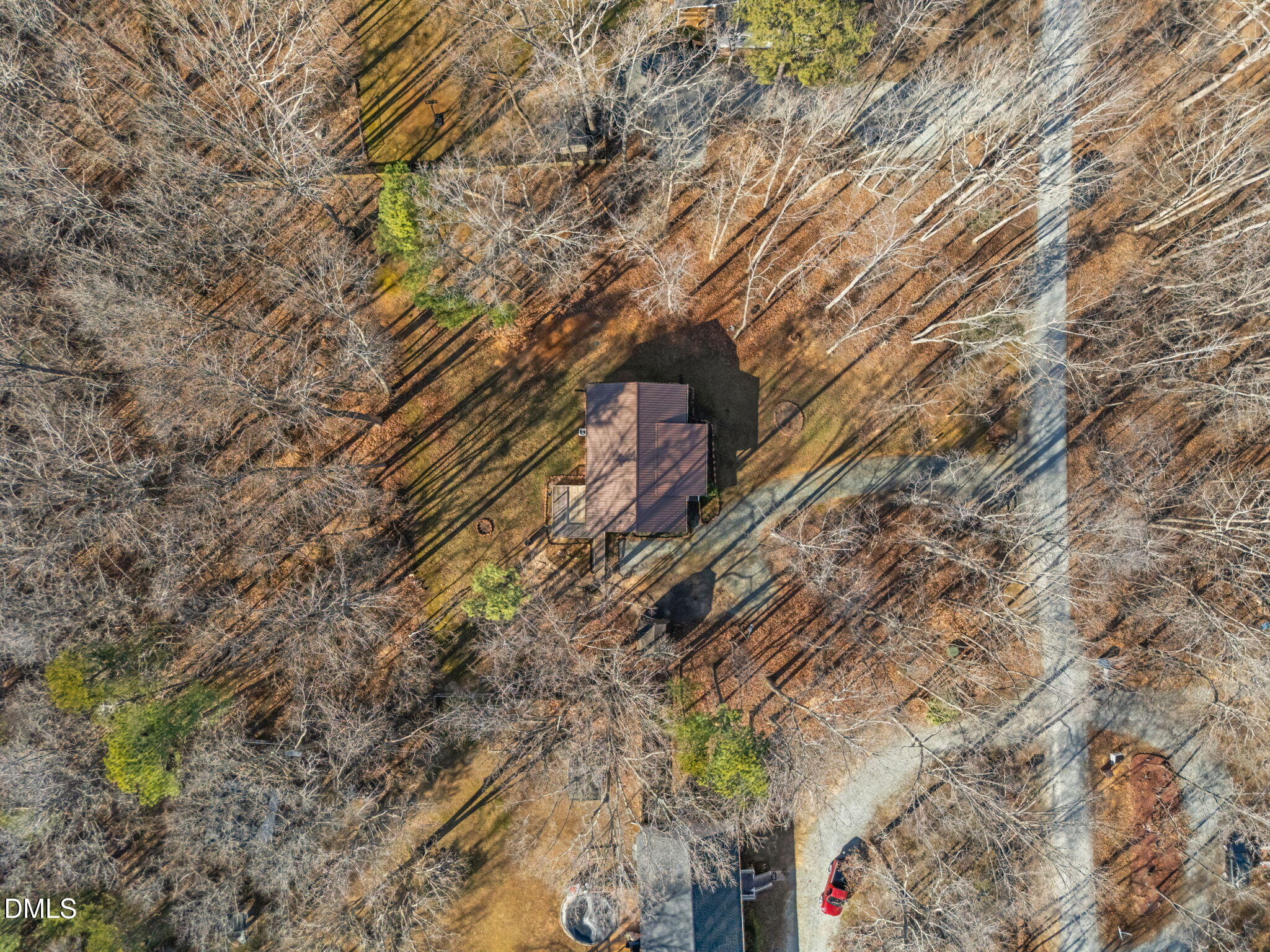 144 Kiser Hicks Road Roxboro, NC 27574 - Photo 37 of 38 a backyard of a building