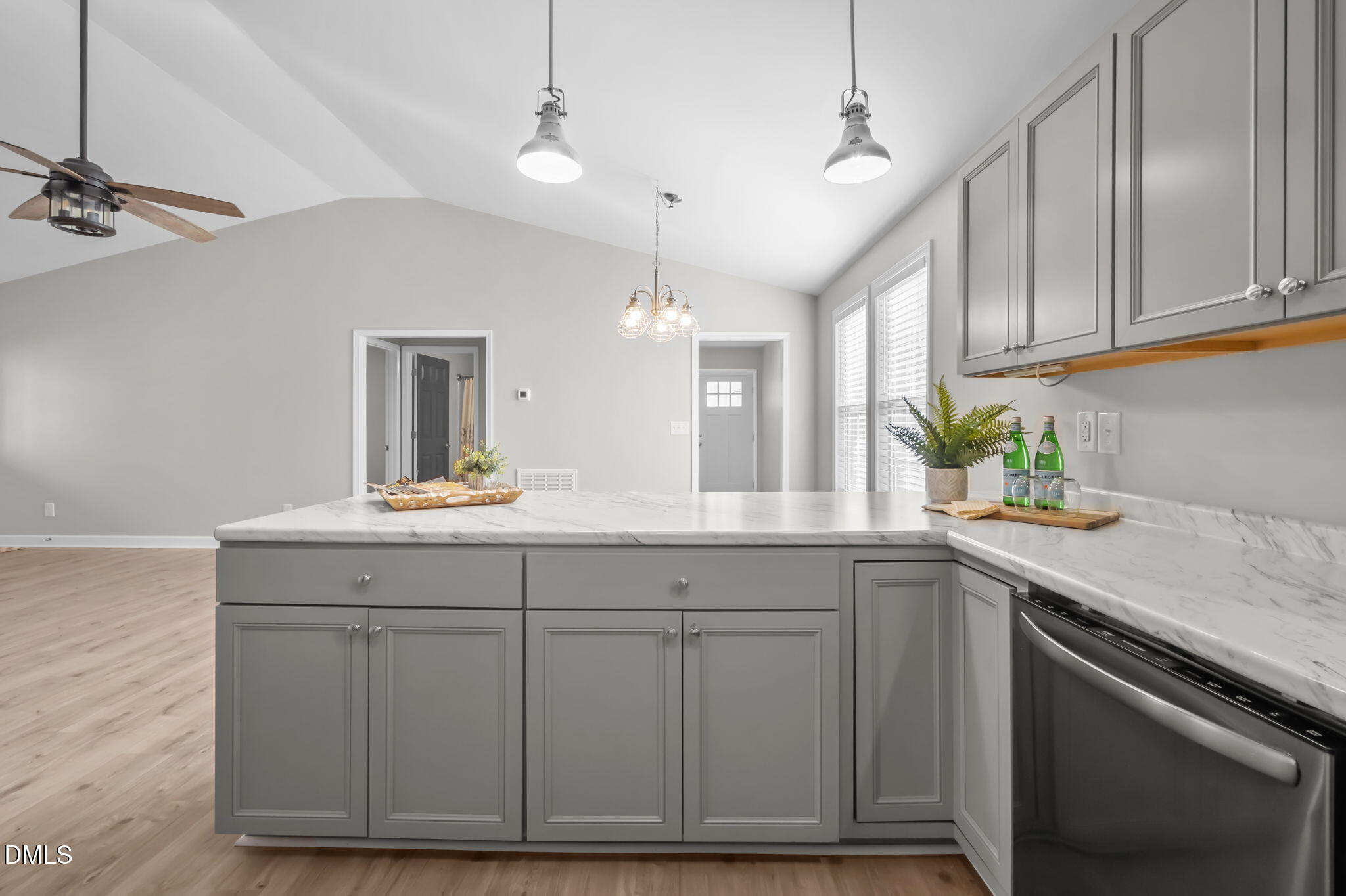 144 Kiser Hicks Road Roxboro, NC 27574 - Photo 9 of 38 a kitchen with cabinets appliances and a counter space