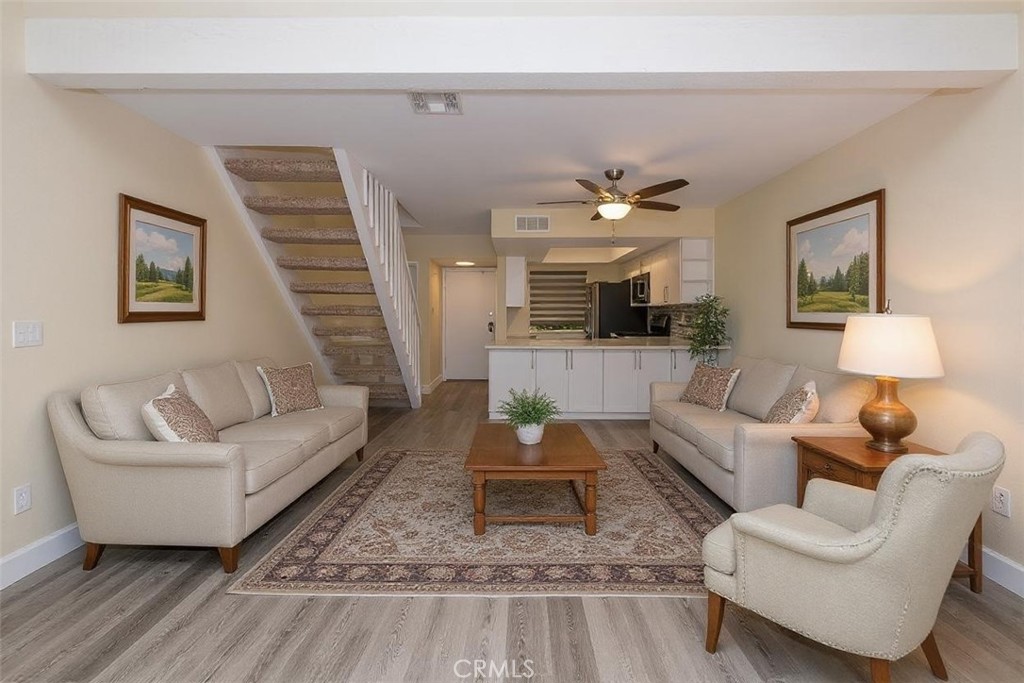 237 Oahu Way Placentia, CA 92870 - Photo 3 of 9 a living room with furniture and a wooden floor