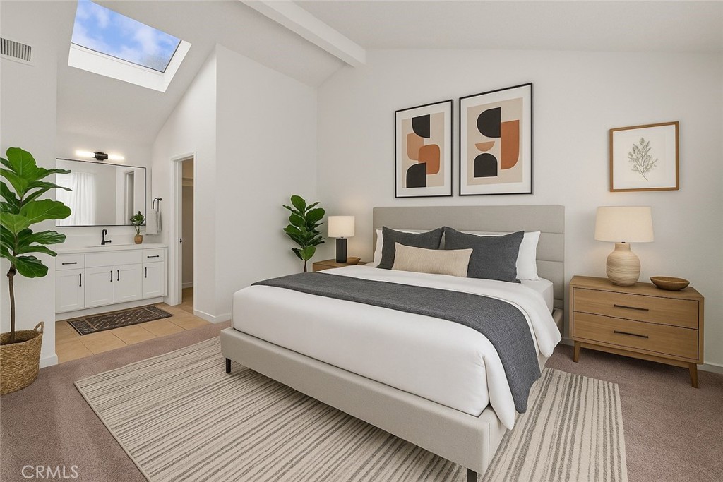 237 Oahu Way Placentia, CA 92870 - Photo 4 of 9 a bedroom with a large bed and a potted plant