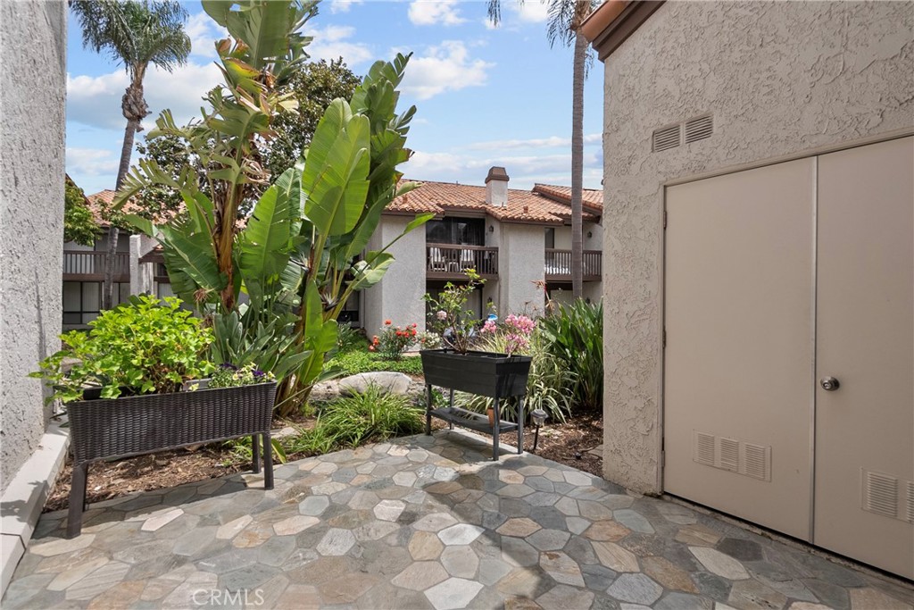 237 Oahu Way Placentia, CA 92870 - Photo 7 of 9 a view of a chairs and table in a backyard