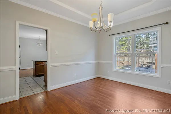 a kitchen with sink cabinets and window
