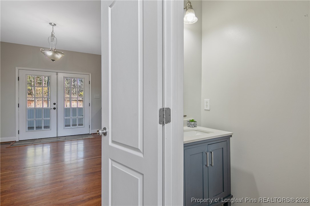 6028 Oak Spring Street Stedman, NC 28391 - Photo 17 of 50 half bath down stairs