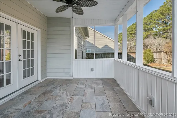 a front view of a house with a yard balcony