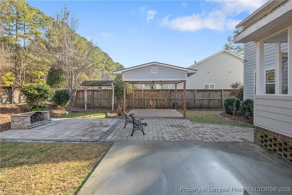 a view of a yard with an outdoor space