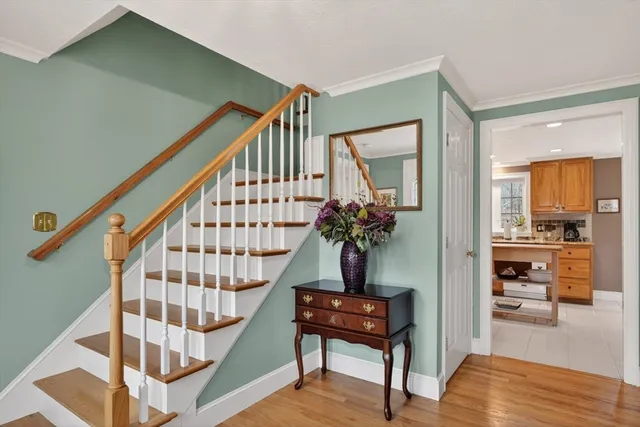 a view of entryway livingroom and hall