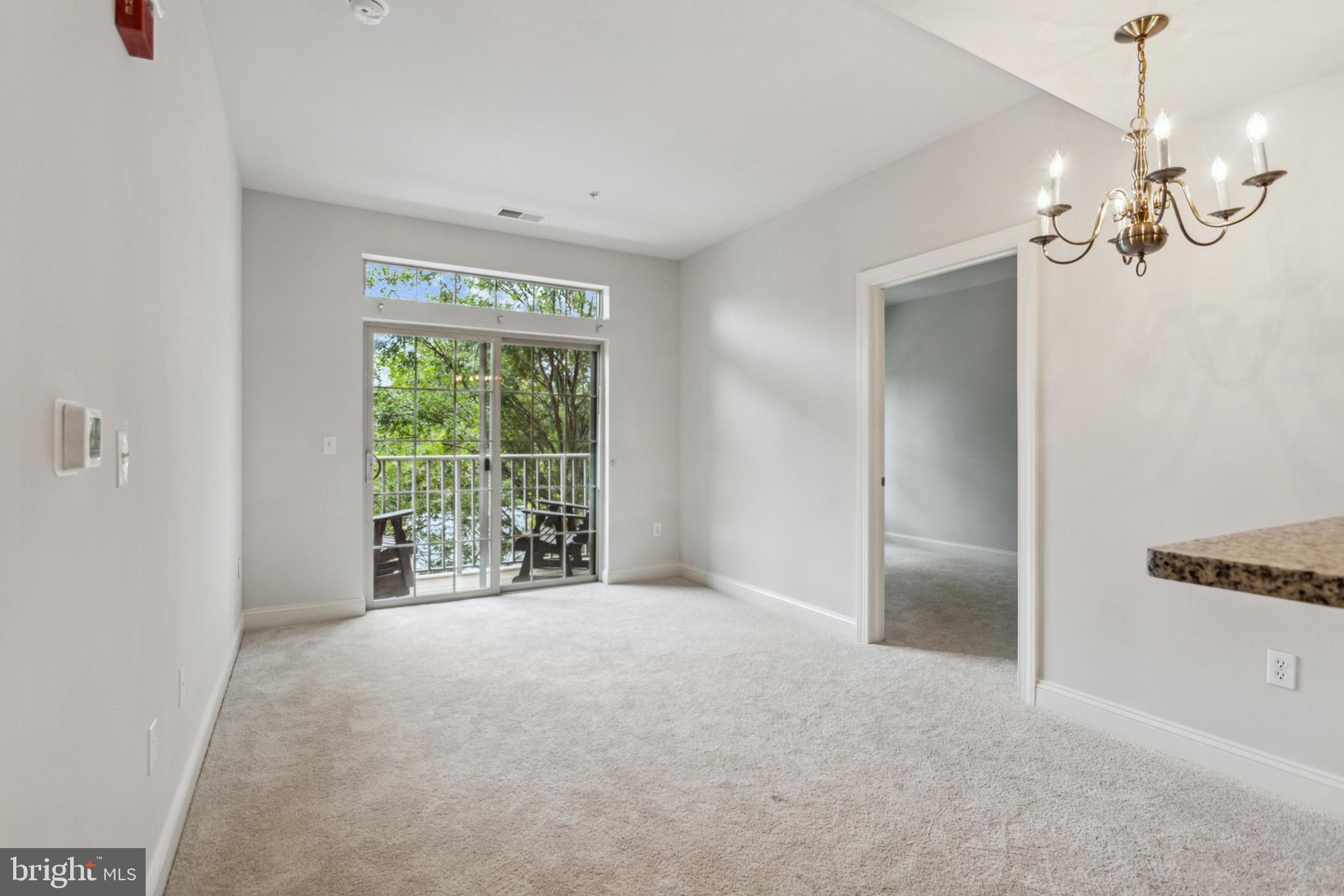 3000 Fountainview Circle, Unit 3311 Newark, DE 19713 - Photo 11 of 32 a view of an empty room with a window