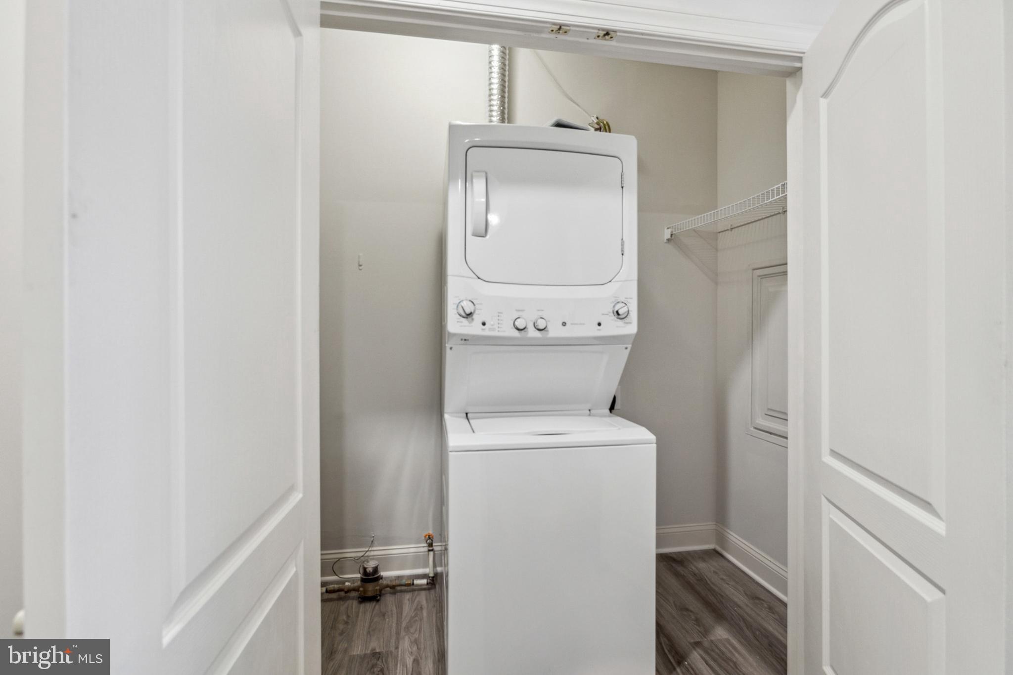 3000 Fountainview Circle, Unit 3311 Newark, DE 19713 - Photo 31 of 32 a utility room with dryer and washer