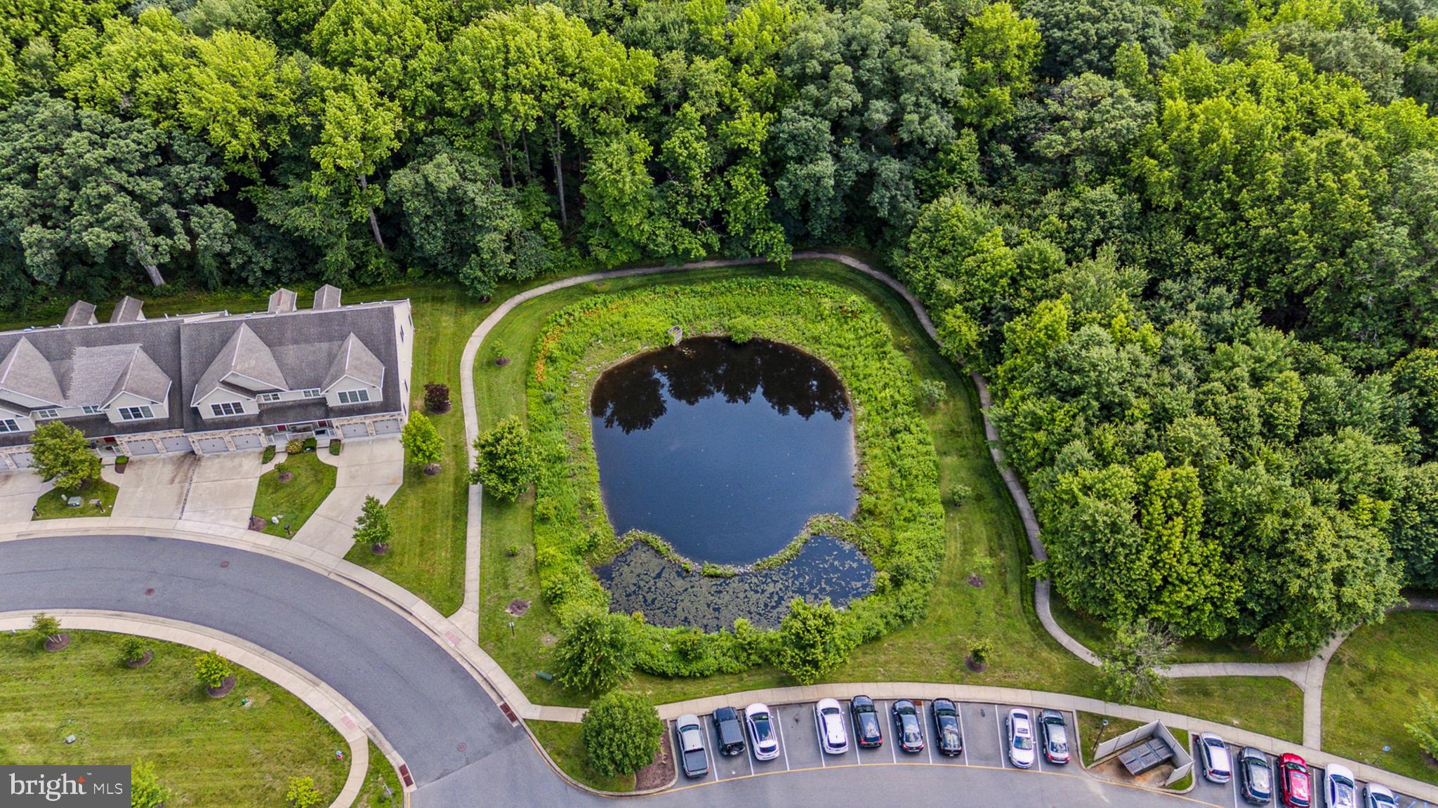3000 Fountainview Circle, Unit 3311 Newark, DE 19713 - Photo 5 of 32 an outdoor view with swimming pool