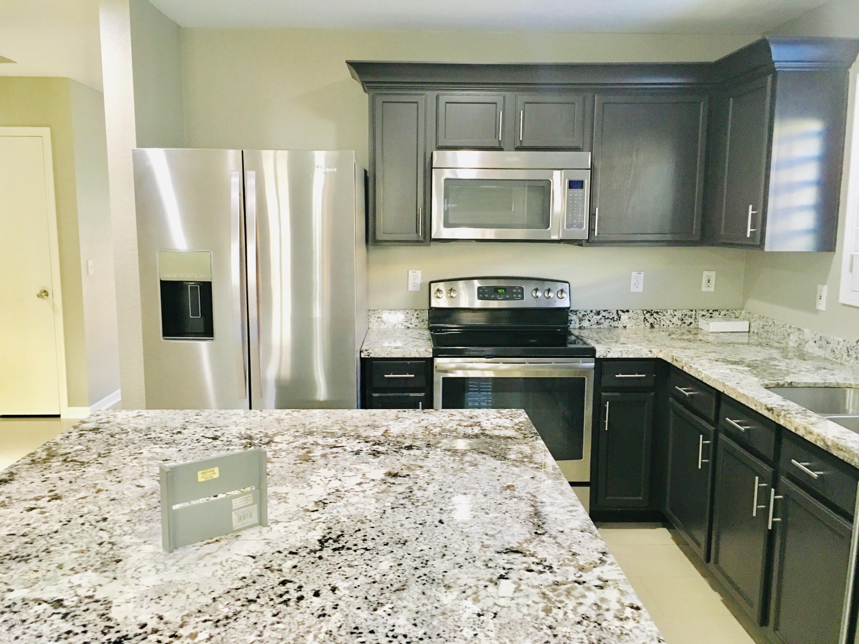 9719 West Payson Road Tolleson, AZ 85353 - Photo 13 of 39 E3C7F0F4-85E5-45F2-813E-24C8FCD4A22B