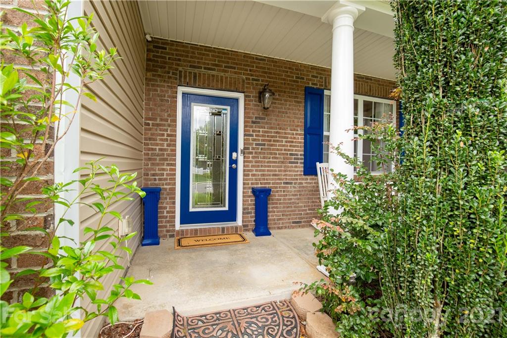 321 Allspice Road Fort Mill, SC 29708 - Photo 4 of 29 front view of a brick house with a large window