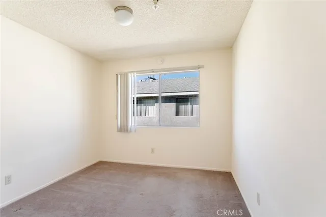 a view of a room with windows