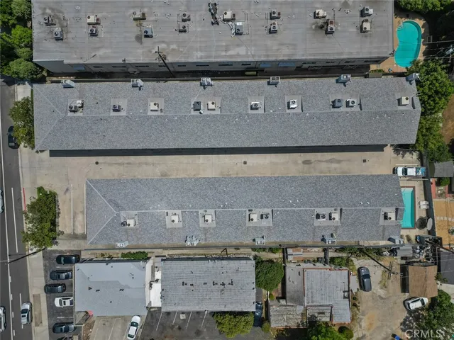 a view of balcony with wooden floor and stairs