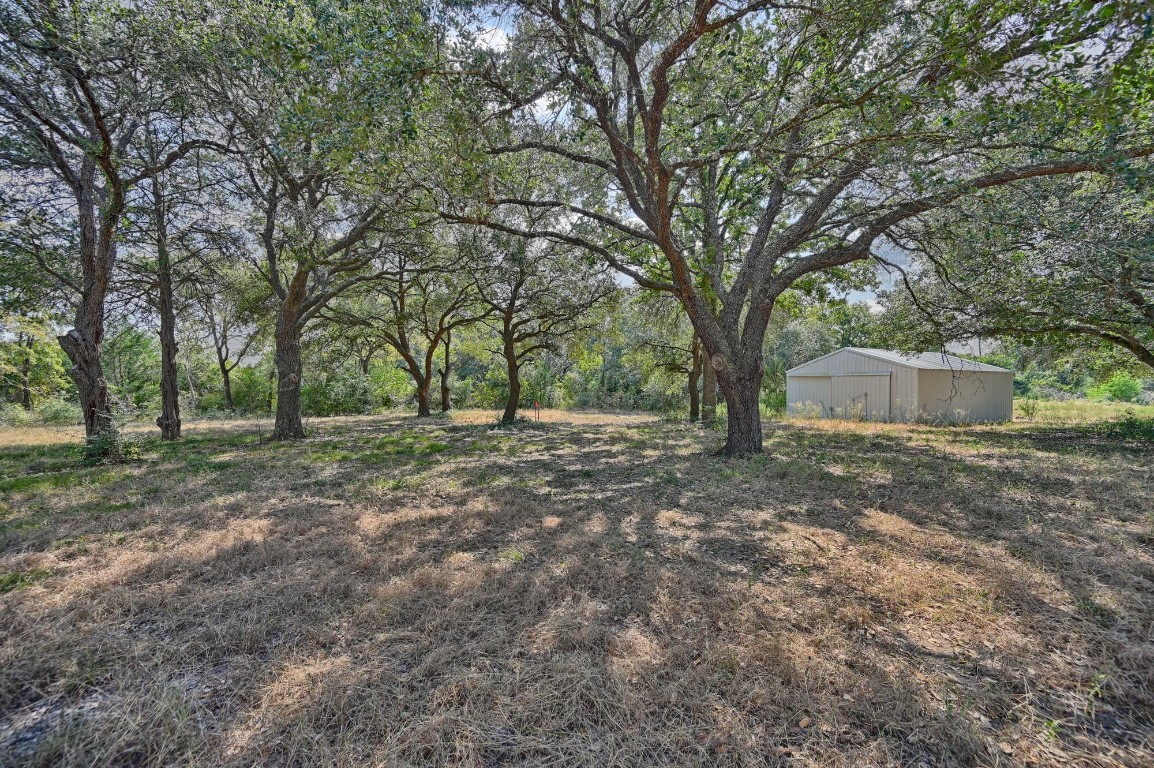 18105 Sweed Road Washington, TX 77880 - Photo 3 of 22 a view of outdoor space with trees