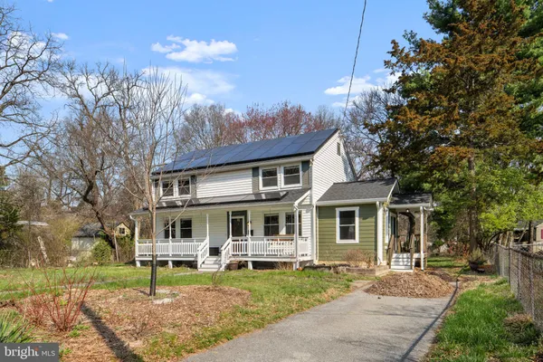 a view of a yard in front of a house