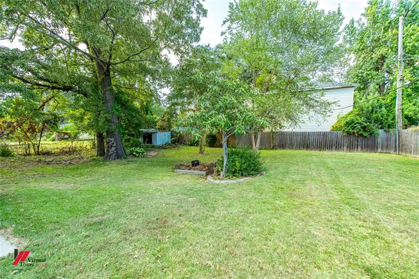 a view of a garden with a slide