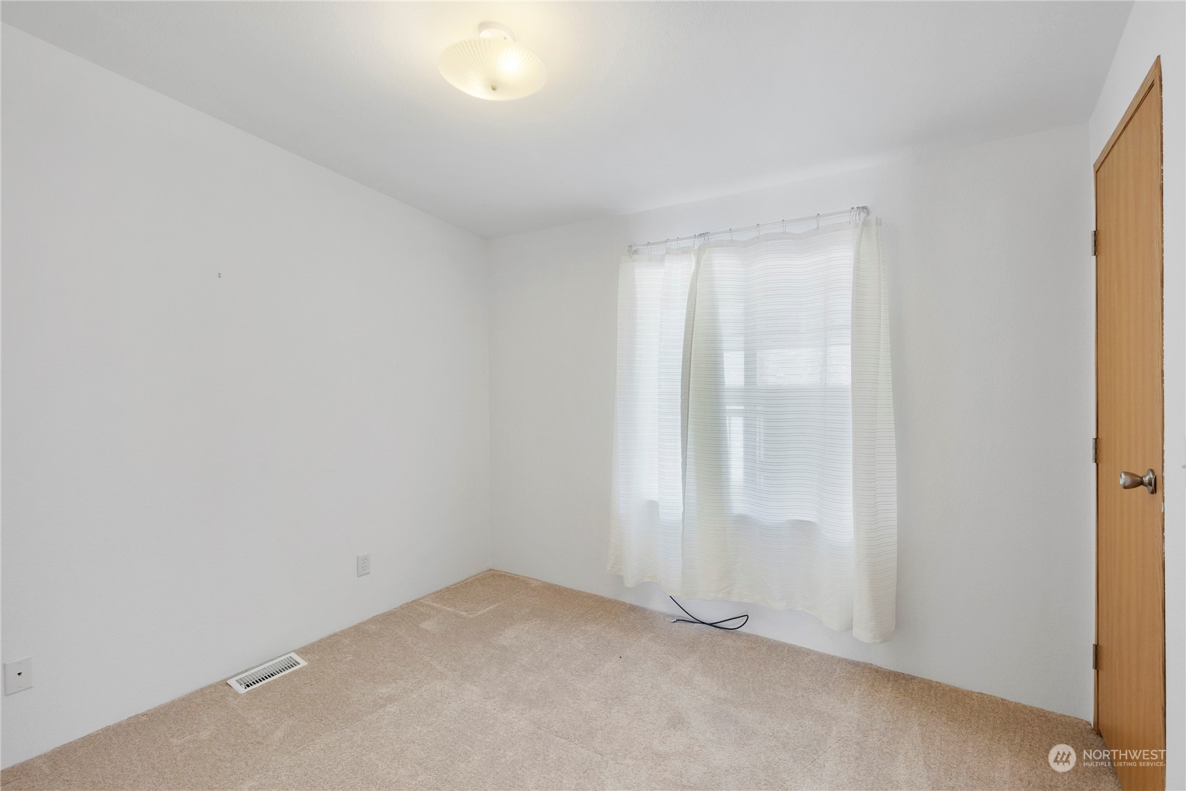 1208 Spruce Drive Enumclaw, WA 98022 - Photo 13 of 25 an empty room with window