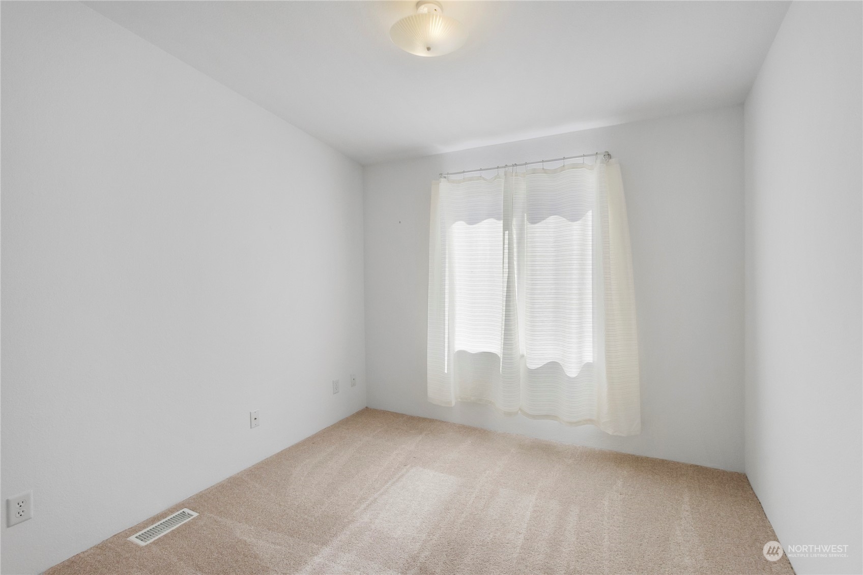1208 Spruce Drive Enumclaw, WA 98022 - Photo 16 of 25 a view of an empty room with a window
