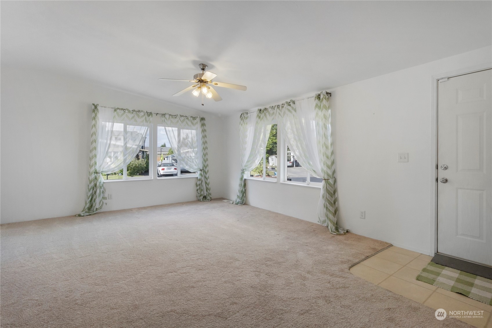 1208 Spruce Drive Enumclaw, WA 98022 - Photo 2 of 25 a view of a livingroom with a staircase