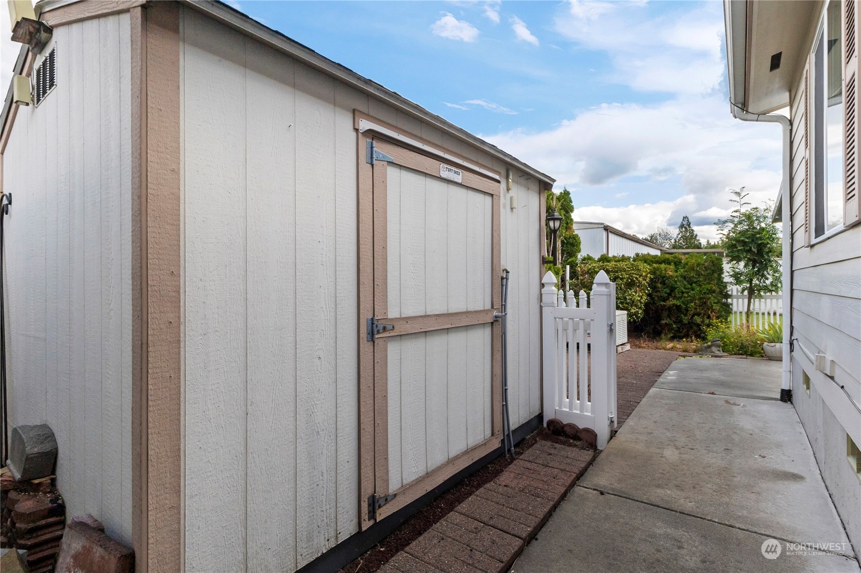 1208 Spruce Drive Enumclaw, WA 98022 - Photo 21 of 25 a view of a house with backyard