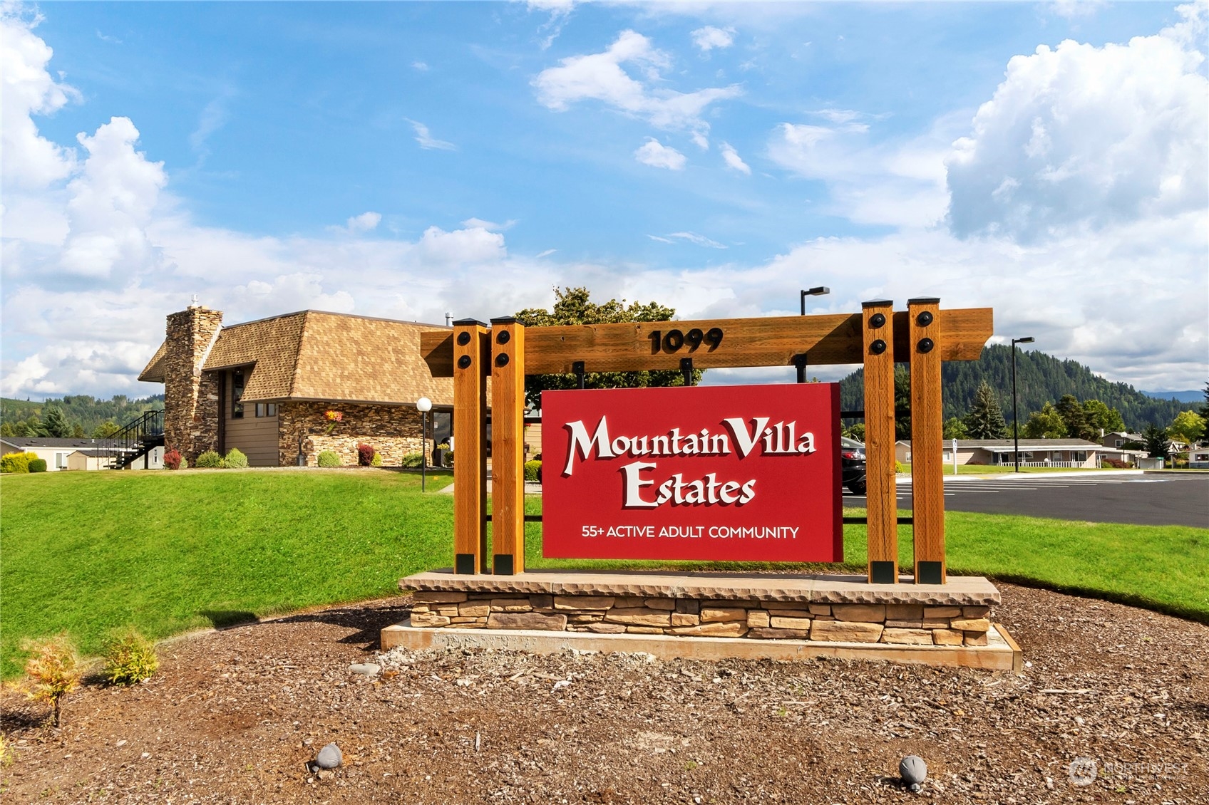 1208 Spruce Drive Enumclaw, WA 98022 - Photo 25 of 25 a sign that is sitting on the side of a road