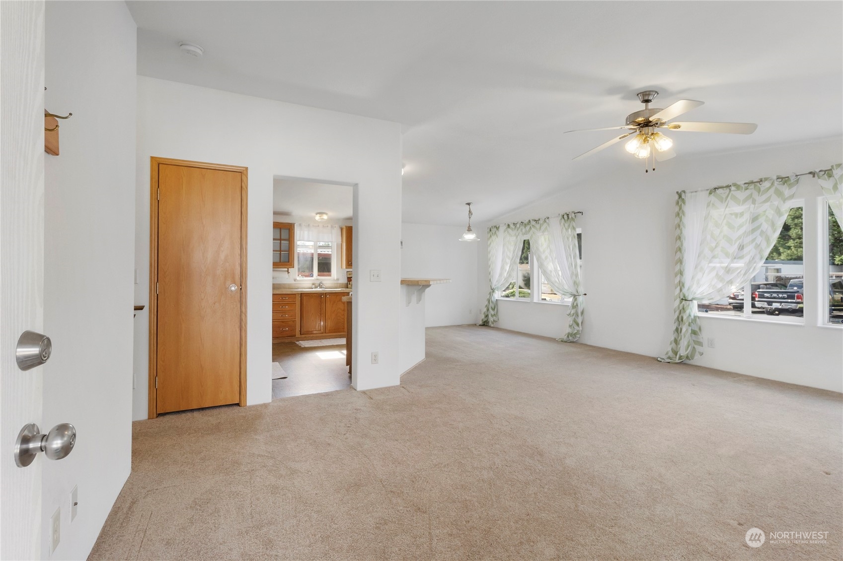 1208 Spruce Drive Enumclaw, WA 98022 - Photo 4 of 25 a view of an empty room with a window