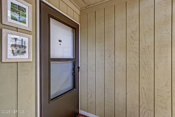 a view of elevator with hallway