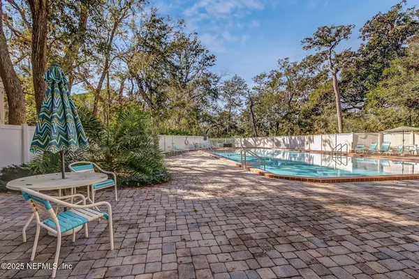 a view of backyard with green space