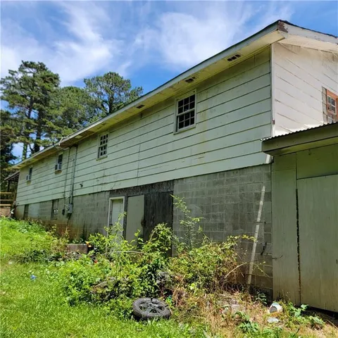 a backyard of a house with lots of green space