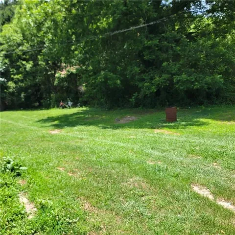 a view of outdoor space and deck of the house