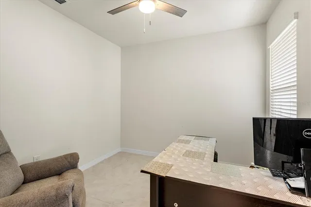 a room with a couch and a window