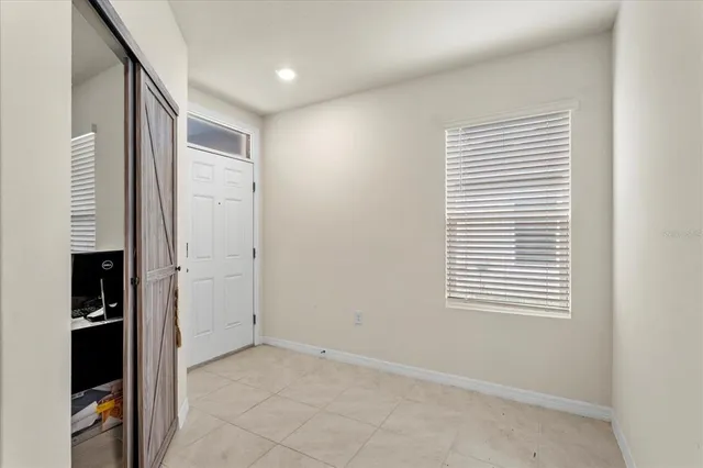 an empty room with windows