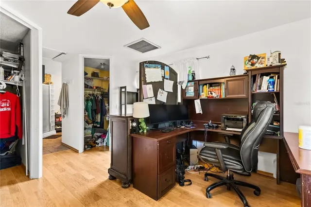a view of a workspace with furniture