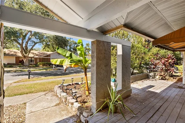 a view of swimming pool with outdoor seating and a yard