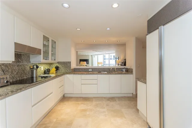 a view of a hallway with seating area