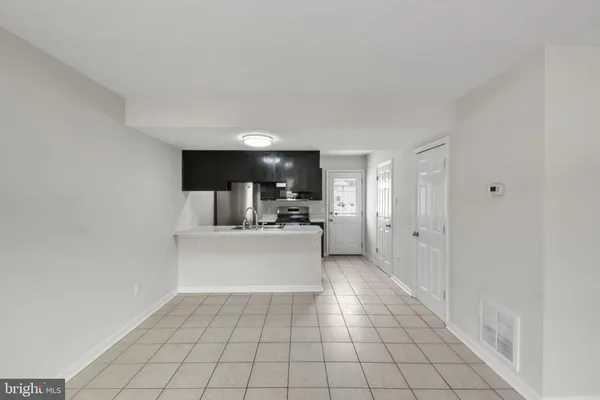 a view of kitchen with windows