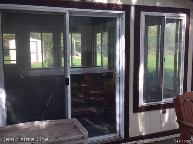 14955 28 Mile Road Washington, MI 48094 - Photo 39 of 51 SUNROOM WITH HOT TUB INCLUDED