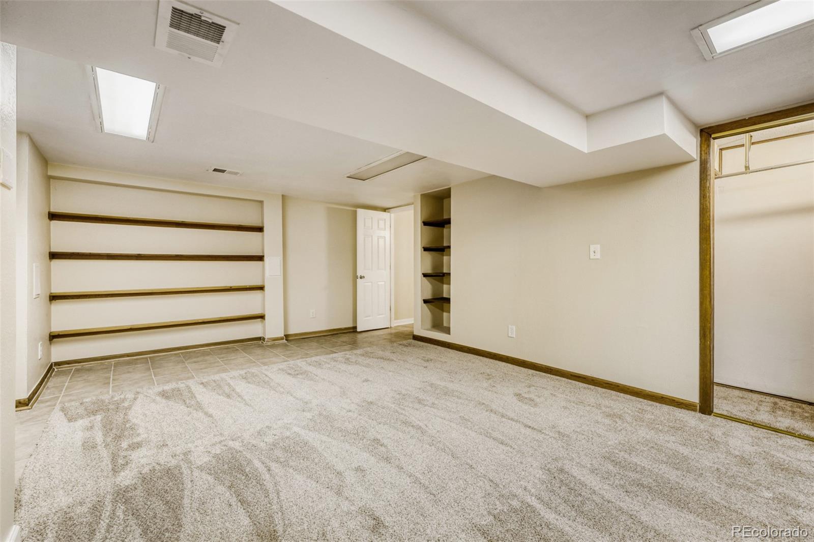 9787 Lane Street Thornton, CO 80260 - Photo 20 of 29 a view of an empty room with a window