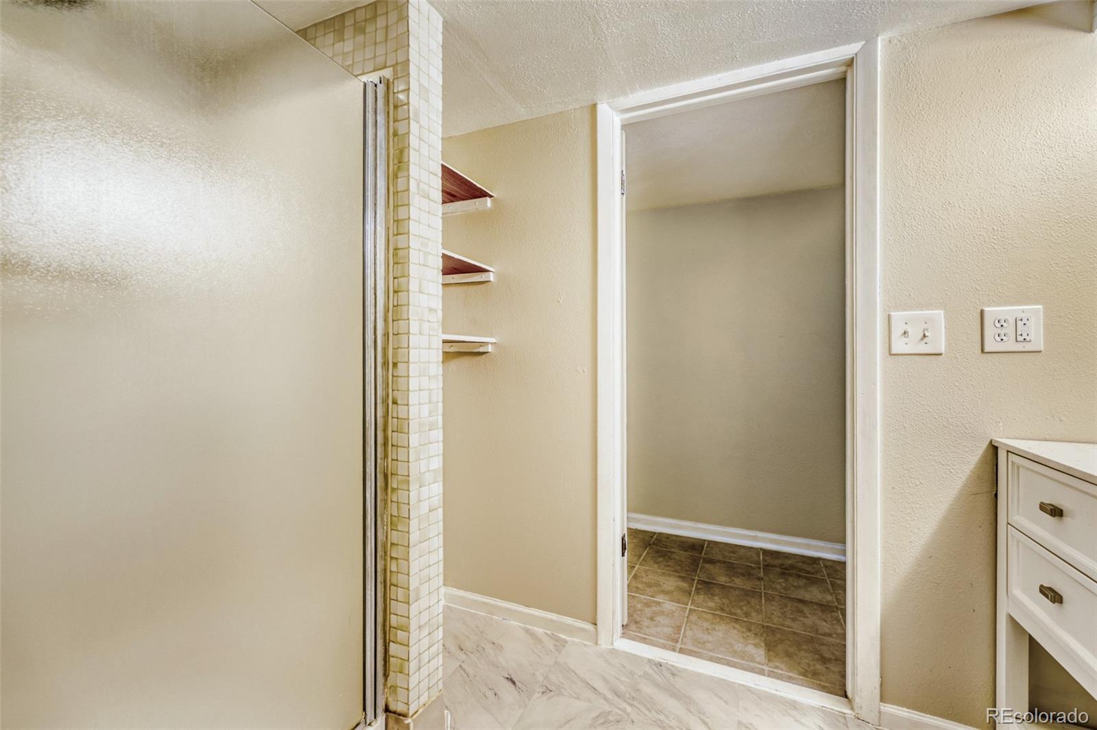 9787 Lane Street Thornton, CO 80260 - Photo 22 of 29 a view of closet area