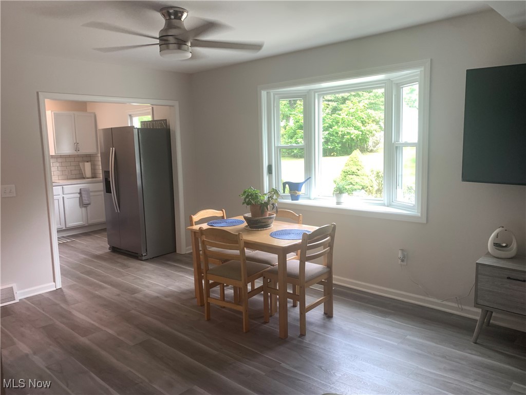 1714 Woods Road Akron, OH 44306 - Photo 8 of 28 Massive dining area with all new bay windows