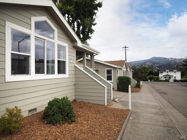 a house view with a backyard space