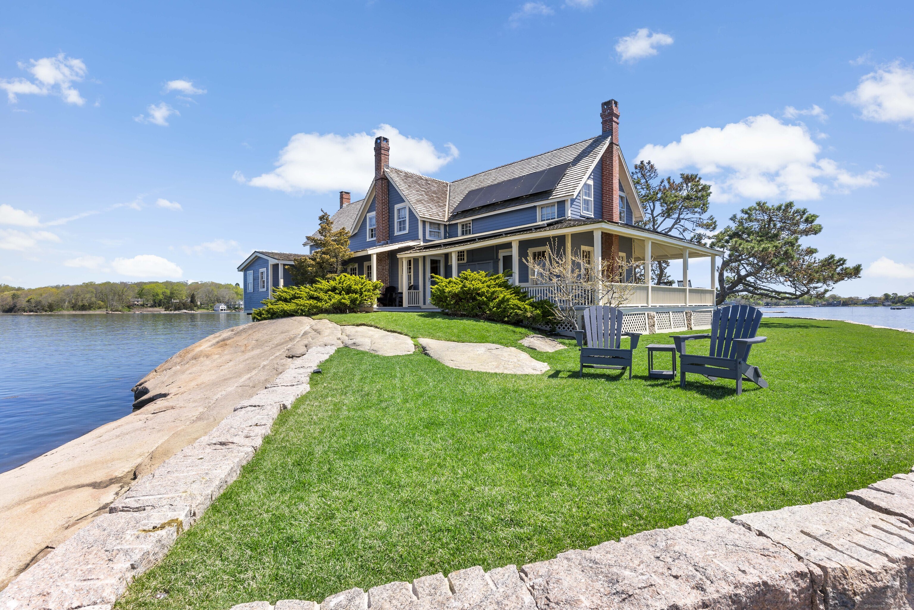 Belden Island Branford, CT 06405 - Photo 21 of 40 a view of a house with a yard