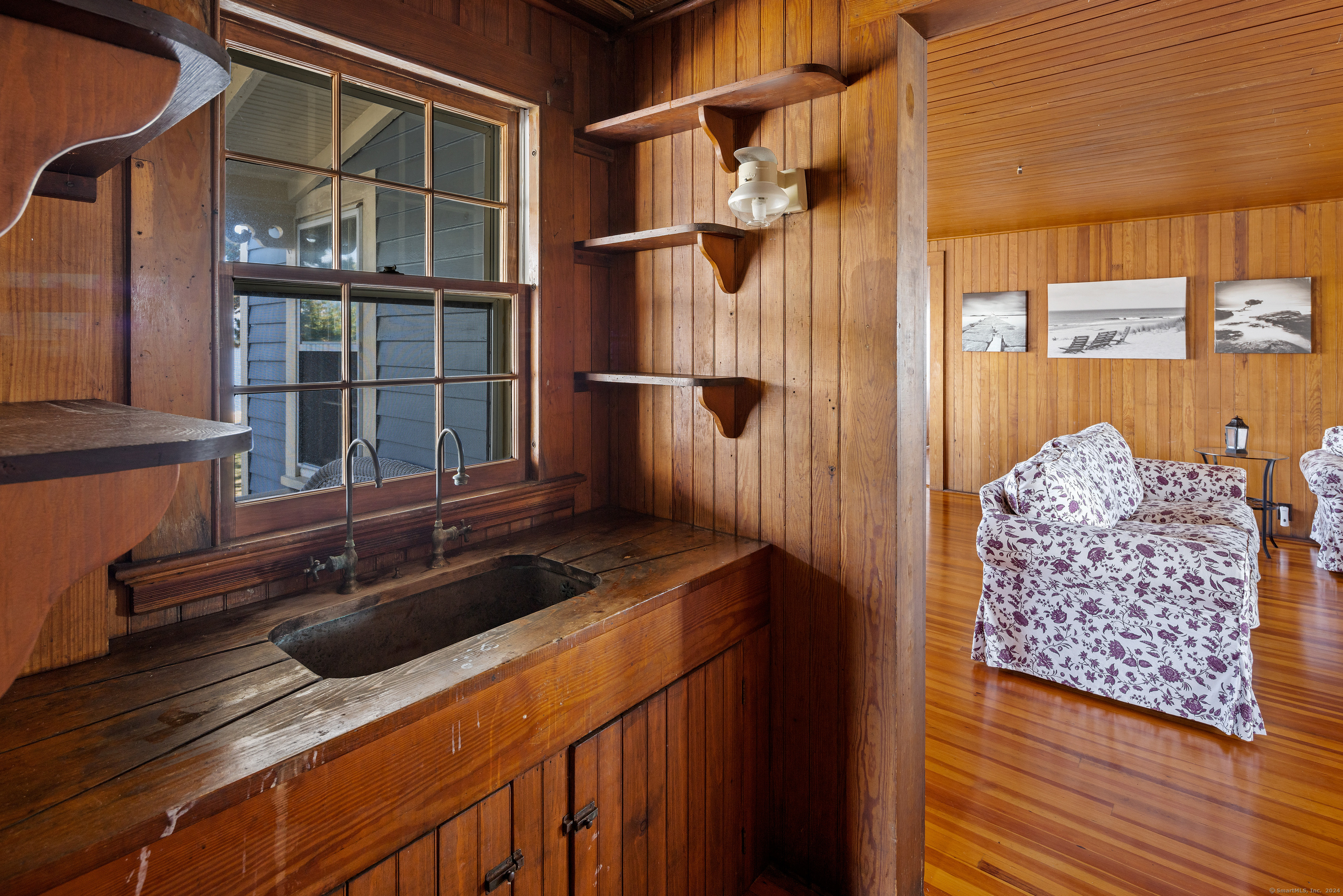 Belden Island Branford, CT 06405 - Photo 25 of 40 a bathroom with a sink and a mirror