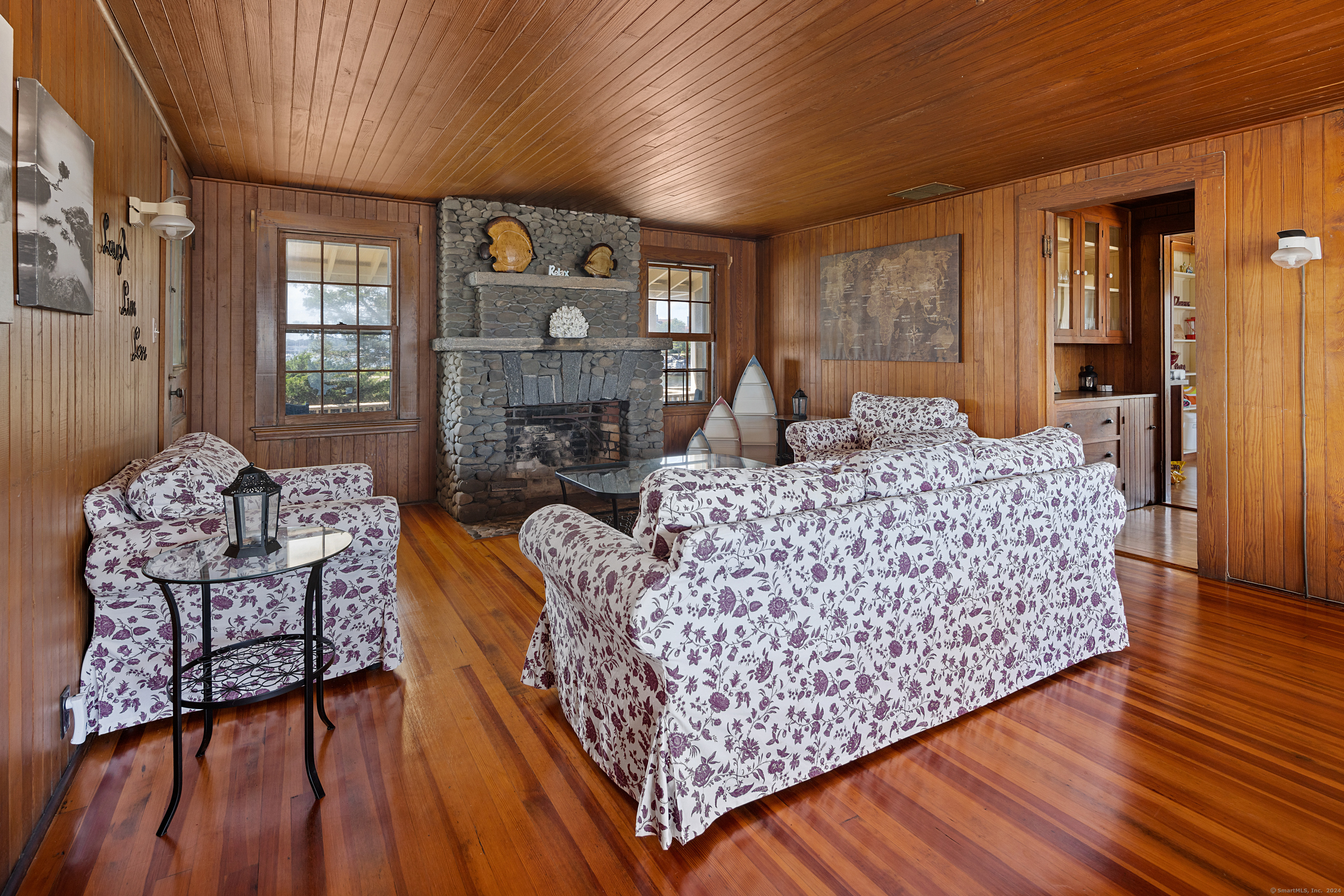 Belden Island Branford, CT 06405 - Photo 26 of 40 a living room with furniture and wooden floor