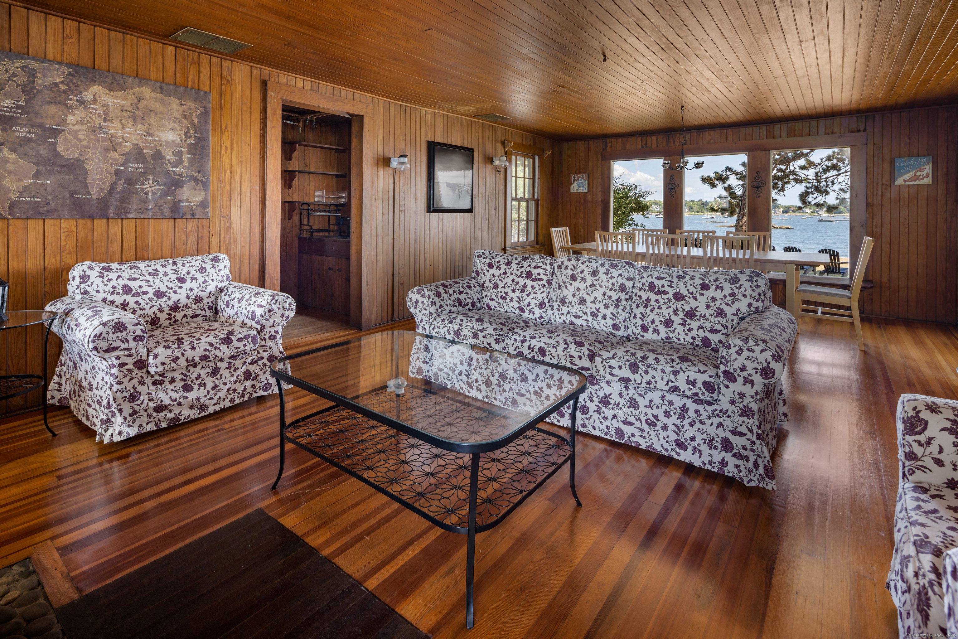 Belden Island Branford, CT 06405 - Photo 28 of 40 a living room with furniture and a large window